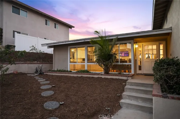 Low maintenance front yard  with a touch of nature and sophistication