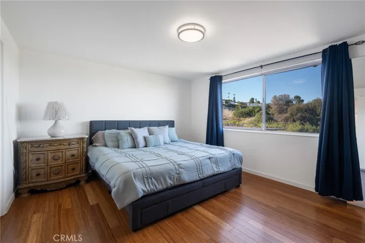 Primary bedroom with an amazing view at any time of the day or night. Enjoy the view of DTLA from here.