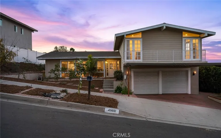 Nothing short of stunning curb appeal with a picturesque sky light backdrop that enhances the aesthetic charm.