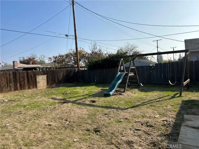 swing set in huge back yard