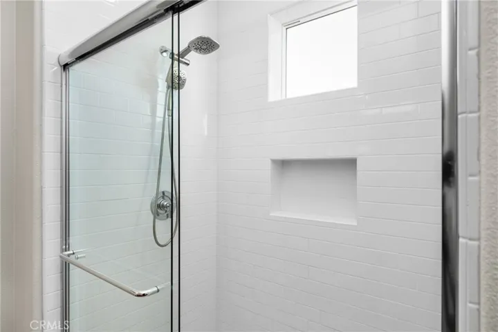 a spacious walk-in shower