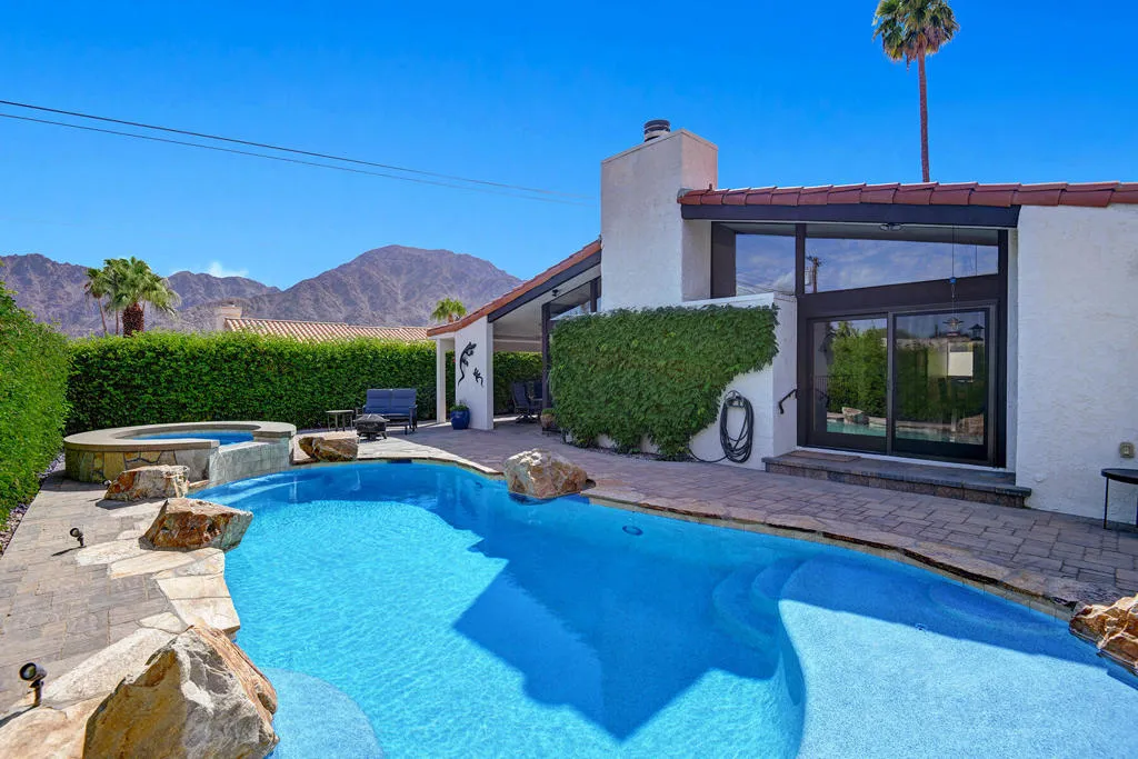 BACK OF HOME OVER POOL.jpg mls