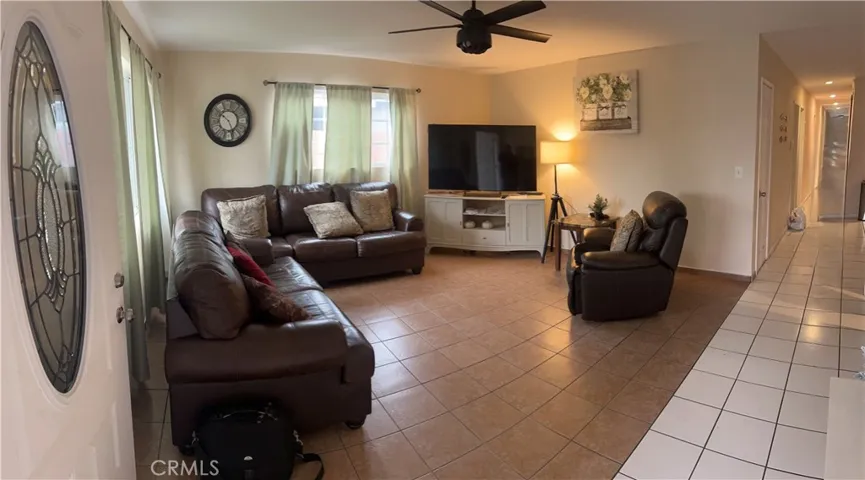 Entering the living room through the front door.