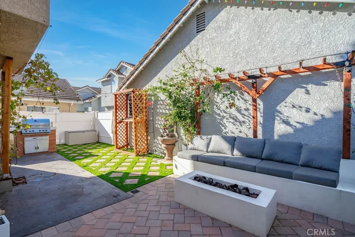 Private patio with built in seating and fire pit