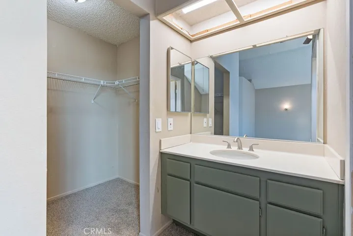 Primary bedroom,  walk-in closet