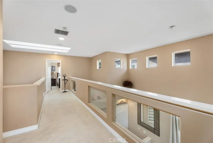 Upstairs Primary bedroom & 3 bedroom located on opposite sides of long hallway