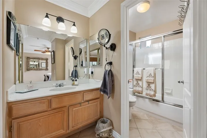 Third bedroom en suite  bath has separate vanity area from the bath/shower/toilet area