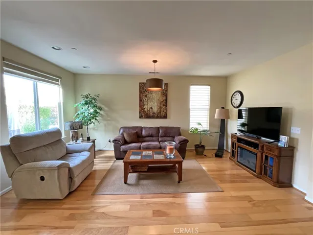 Featuring Hardwood floors, recessed lighting and Hunter Douglas designer window treatments.