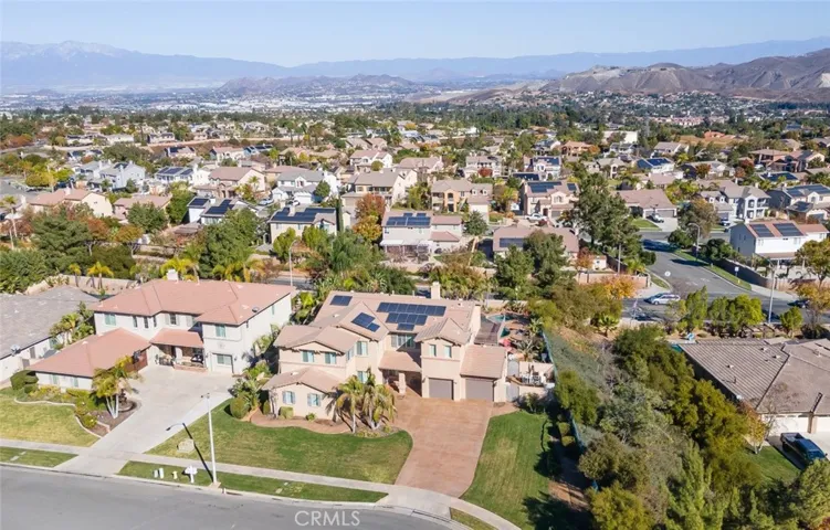 Situated in a picturesque community with mountain views and beautifully maintained surroundings.