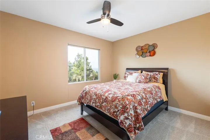 Spacious and inviting bedrooms with large windows, offering comfort and relaxation.