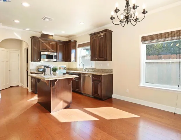 1st Floor - Kitchen, Dining Area, Half Bath, Laundry Room, Attached Garage