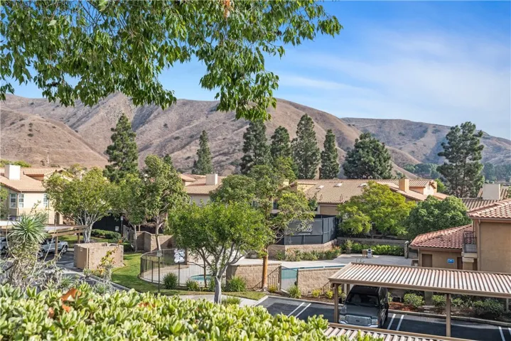 scenic mountain views, spacious outdoor spaces, and lush landscaping.