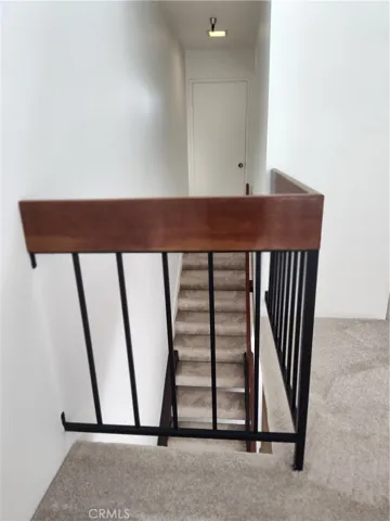 View from bedroom loft to stairs