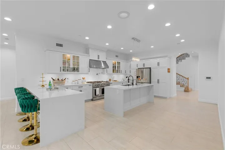 Beautiful kitchen with high ceiling and island