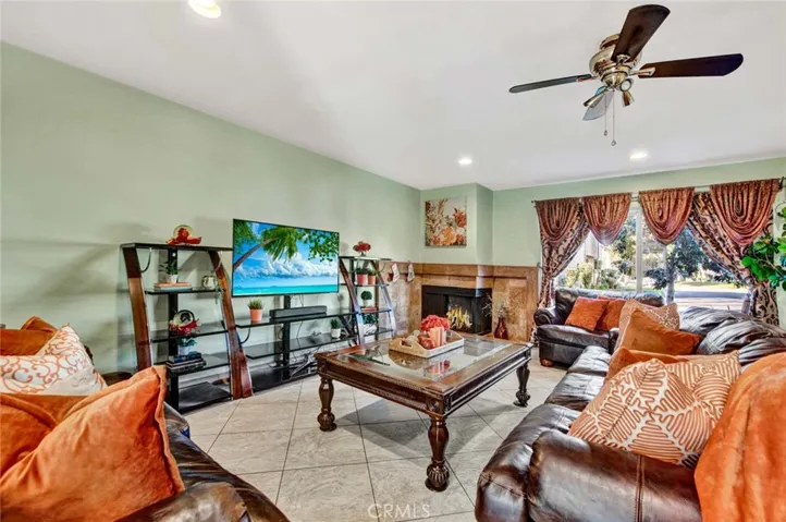 Large living room with room for formal dining under​​‌​​​​‌​​‌‌​​‌​​​‌‌​​​‌​​‌‌​​‌‌​​‌‌​​​​ stairs