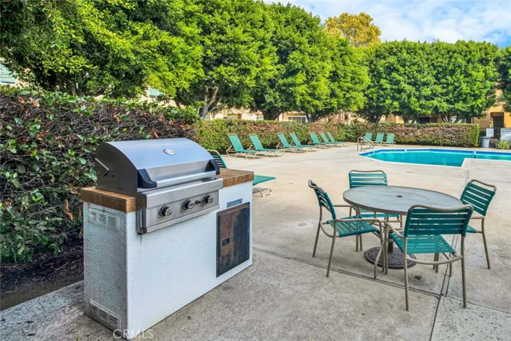Community Pool and BBQ area with remodeled club house
