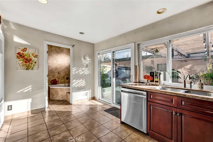 Kitchen over looking private patio, direct access to 2 car garage