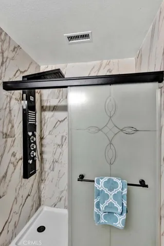 Upgraded shower with top of the line multi shower head and massage jets