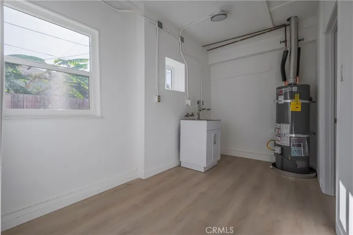 Laundry room in the back of the garage.