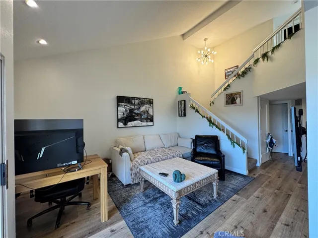 Main living area with a desk nook. Great use of space!