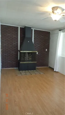 Enclosed patio with fireplace...about 9 ft x 19 ft.