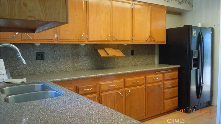 Updated kitchen with granite counters.
