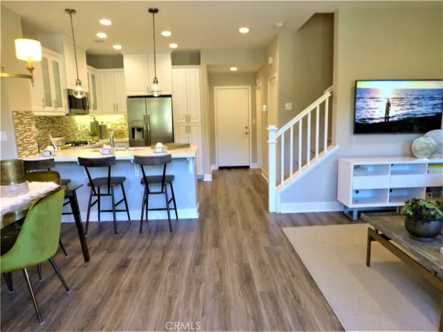 These are photos of the model home so you can have an idea of what the home will look like. The owner chose beautiful light grey cabinets.