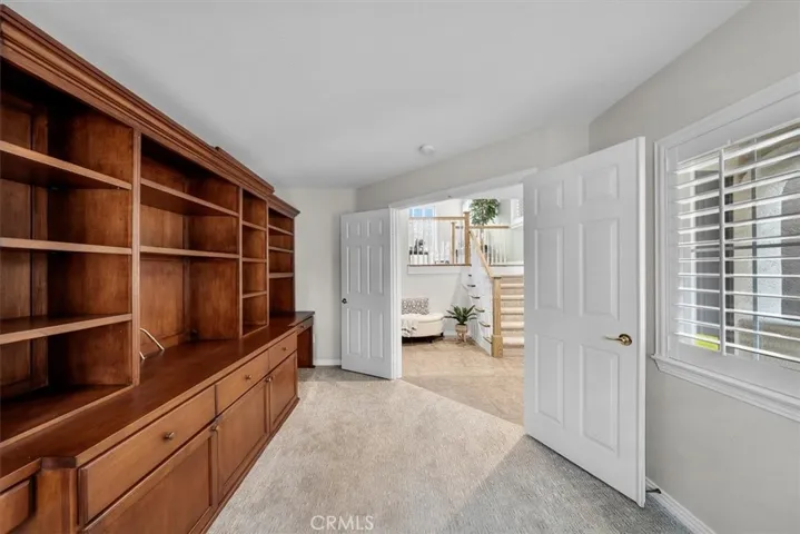 Office with built-ins on entry level