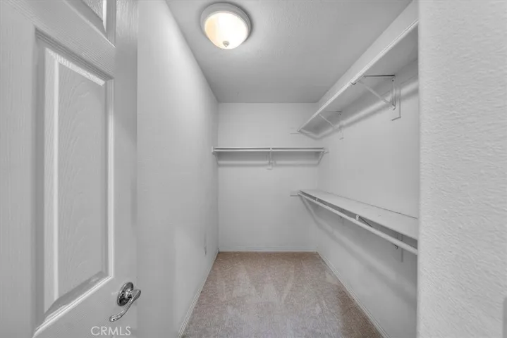 One of 2 closets for the Primary bedroom