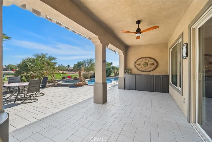 Large exterior patio covered. new pavers give the yard a new look and easy to maintain.