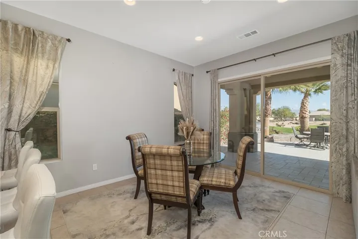 Formal dining room which has the space to sit up to 10 people easily.