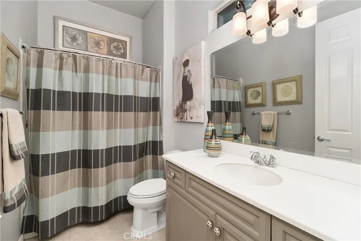 Secondary full bath with designer touches.