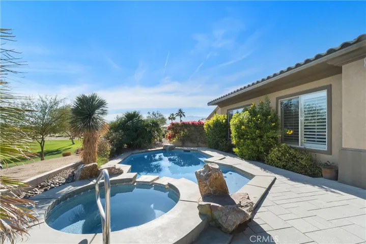 pool and spa all over looking at the lush landscape and views galore!!