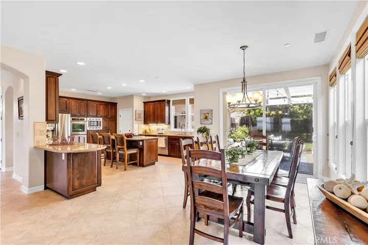 The heart of the home is a large family kitchen with massive storage and a dining area.