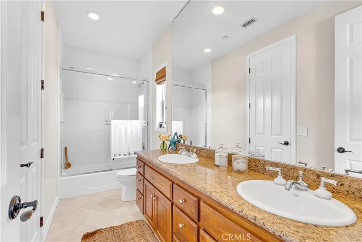 Jack and Jill bathroom with access to bedrooms 3 and four.