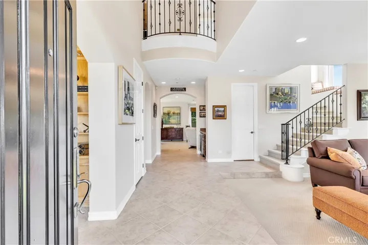 The foyer is impressive with cathedral ceilings and walls of windows!