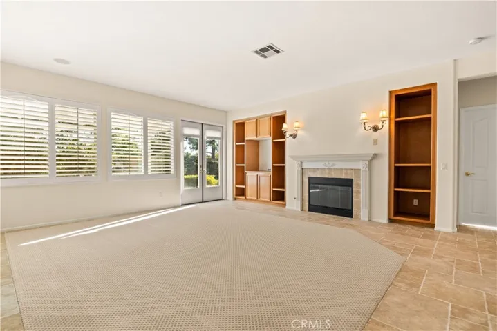 Family room with built-ins and fireplace