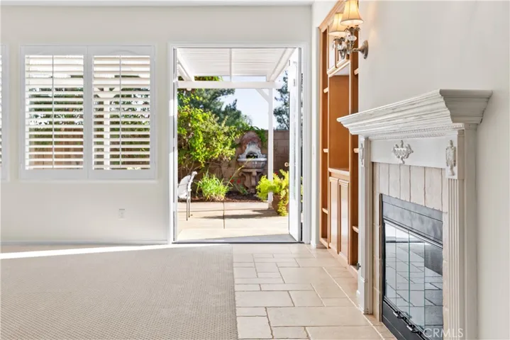 Family room with french doors leading to a covered patio