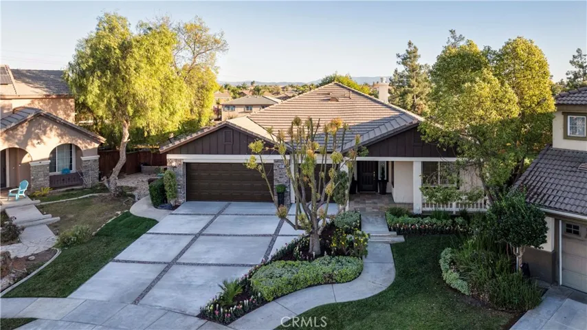 New custom driveway, refreshed landscaping