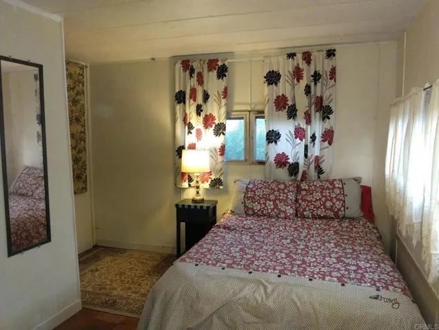 Primary bedroom with attached bathroom