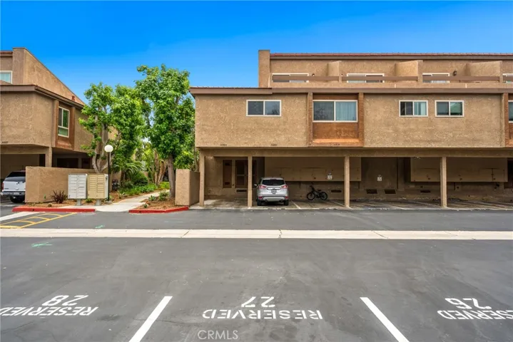 One carport space with additional storage and an assigned uncovered space!
