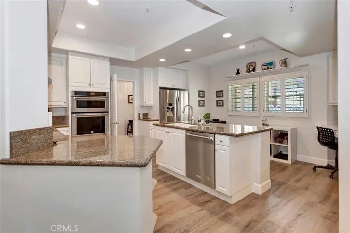 Large kitchen with granite counters