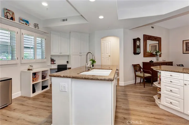Kitchen and hallway to separate laundry room
