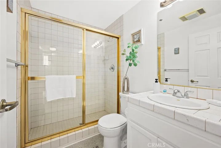 3/4 bath by bonus room (owner unit)