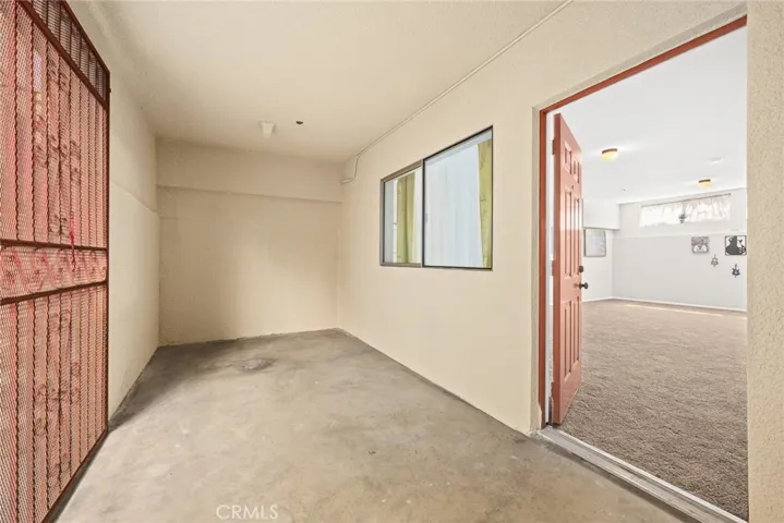 Patio & back door by bonus room (owner unit)