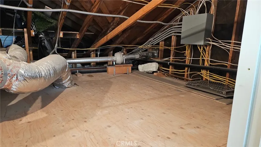 Storage area in attic above kitchen