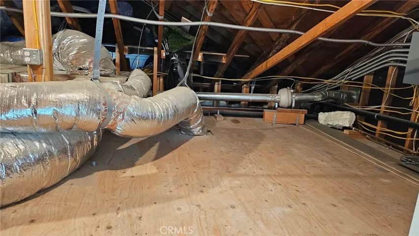 Storage area in attic above kitchen
