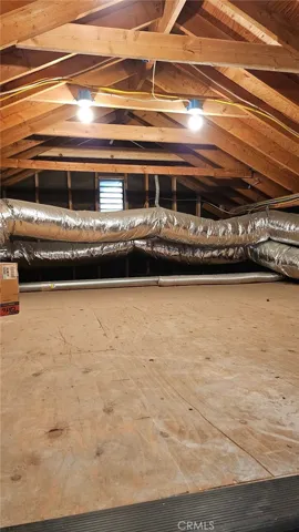 Storage area in attic above living room