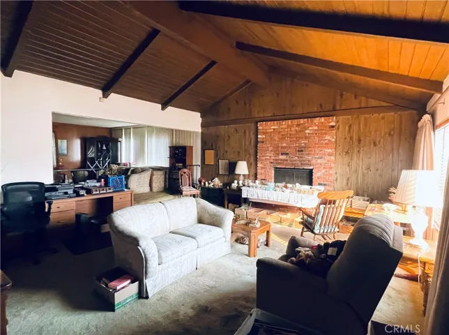 Main living area that is the permitted addition. Please note items in the photo are part of the Estate Sale