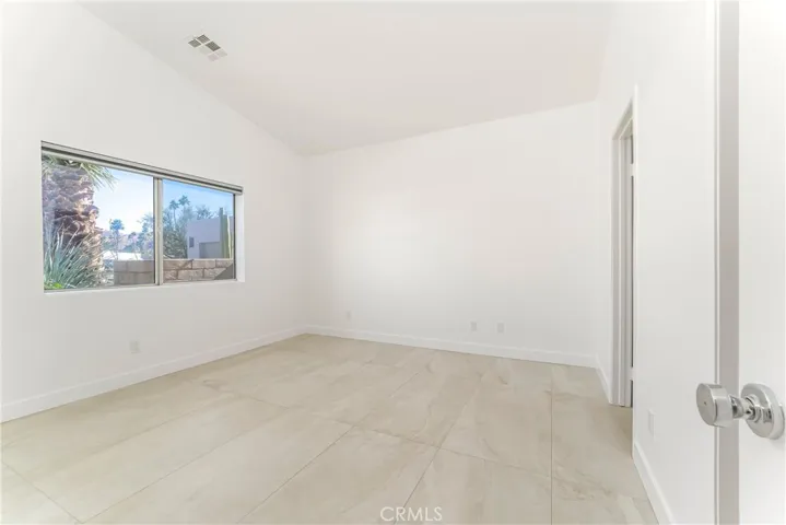 Bedroom suite one with vaulted ceiling, walk in closet and all new bath